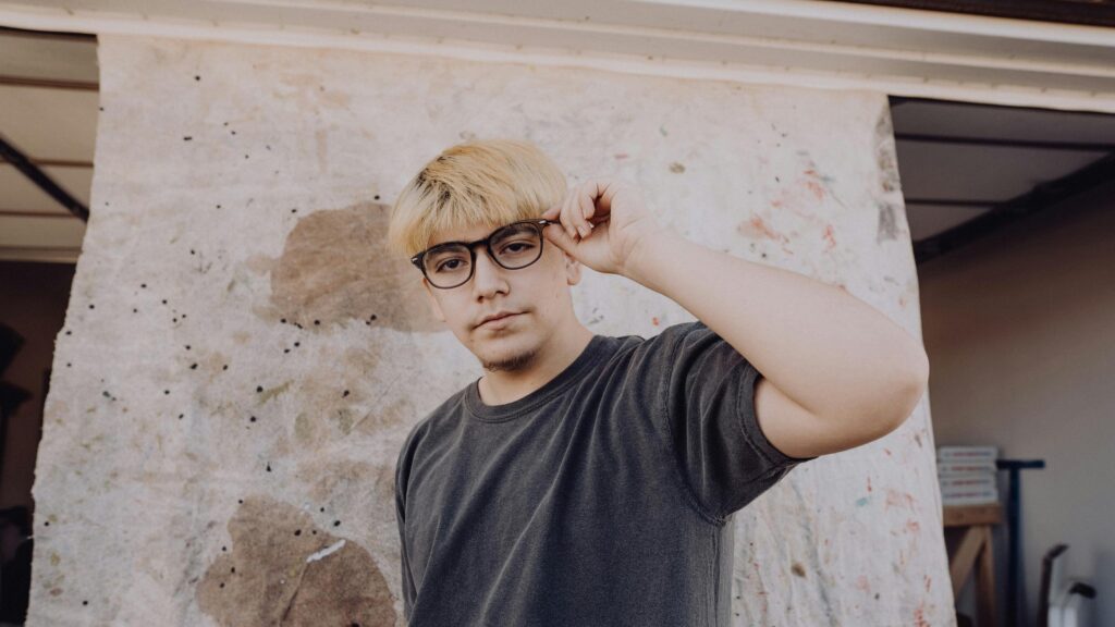 Cool Blonde Guy Posing with Glasses Urban Art Style 4K Wallpaper