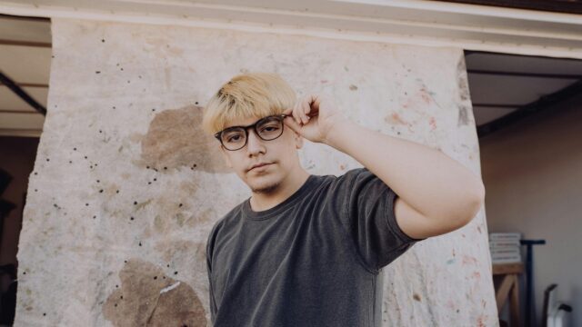 Cool Blonde Guy Posing with Glasses Urban Art Style 4K Wallpaper