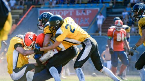 Intense American Football Tackle Action Desktop Wallpaper
