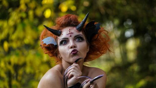Fantasy Demon Woman with Red Hair and Horns 4K Desktop Wallpaper