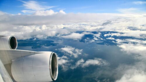 Breathtaking Aerial View from Airplane Window Above Clouds Desktop Wallpaper