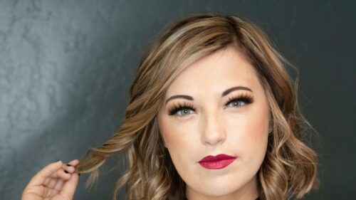 Stunning Portrait of a Woman with Red Lips and Glamorous Makeup 4K Desktop Wallpaper