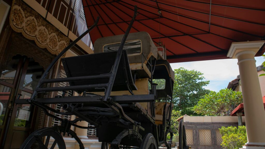Vintage Horse Drawn Carriage Under Red Canopy Desktop Wallpaper