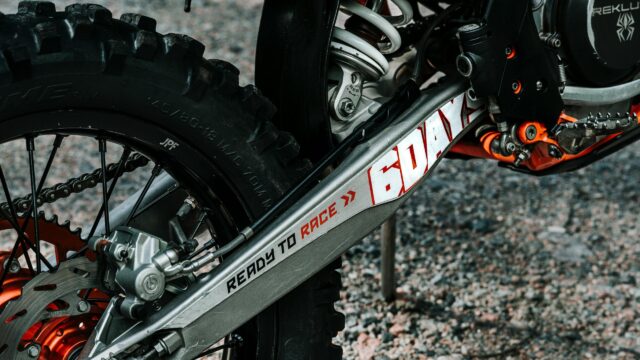 Close-up KTM 6 Days Dirt Bike Swingarm Ready to Race Desktop Wallpaper