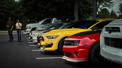 Stunning Sports Car Lineup in Parking Lot 4K Desktop Wallpaper