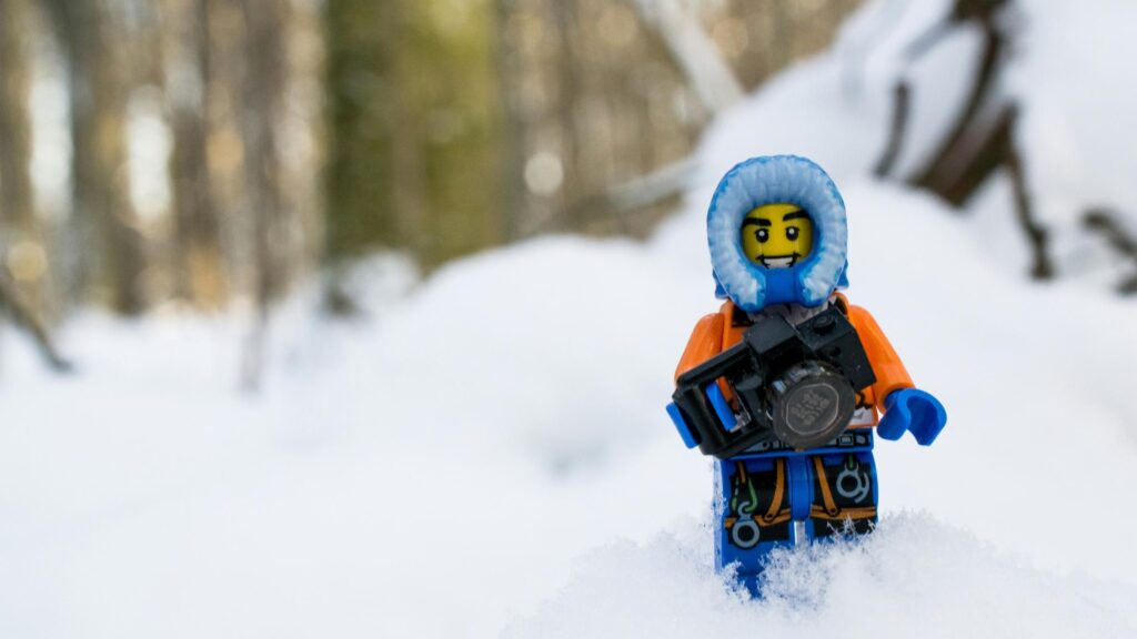 Lego Explorer with Camera in Snowy Forest 4K Wallpaper