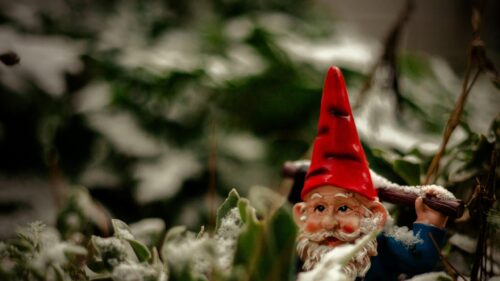 Charming Garden Gnome in Snowy Winter Wonderland Desktop Wallpaper