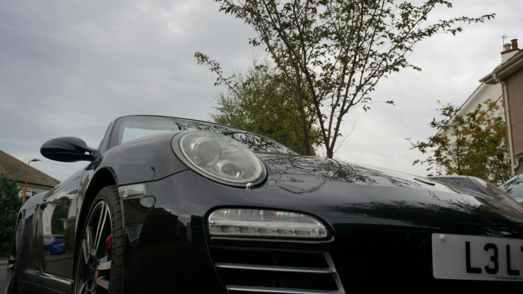 Low Angle Black Porsche 911 Convertible 4K Desktop Wallpaper