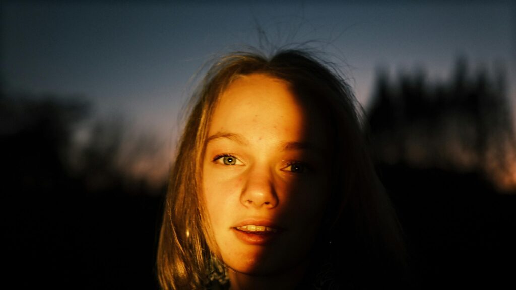 Stunning Golden Hour Portrait of a Young Woman Desktop Wallpaper