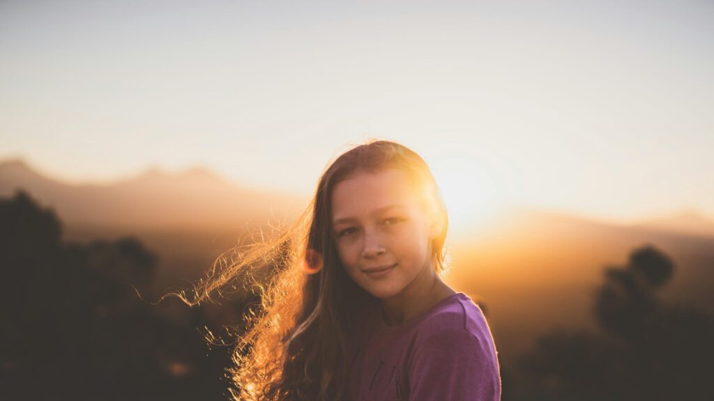 Beautiful Girl Backlit by Golden Sunset Light PC Wallpaper
