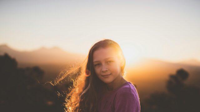 Beautiful Girl Backlit by Golden Sunset Light PC Wallpaper