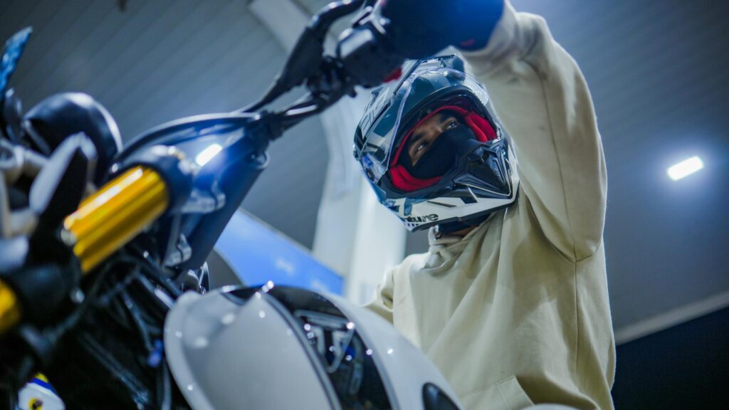 Biker in Helmet on Sportbike at Gas Station 4K Desktop Wallpaper