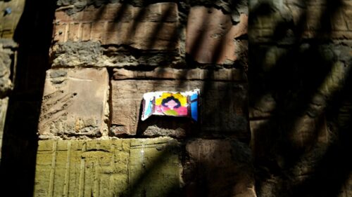 Minimalist Street Art Small Illustration on Brick Wall Desktop Wallpaper
