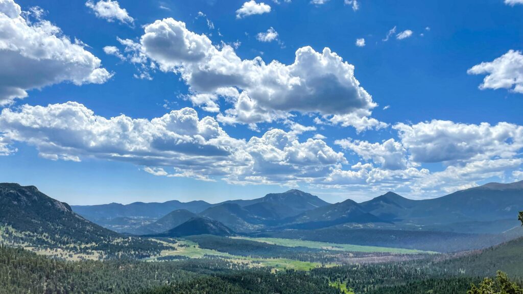 Breathtaking Rocky Mountain Landscape Valley Under Cloudy Blue Sky PC Wallpaper