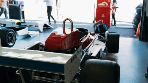Vintage Formula One Race Car Pit Garage 4K Wallpaper