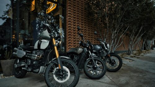 Triumph and Indian Motorcycles Parked Outdoors Desktop Wallpaper