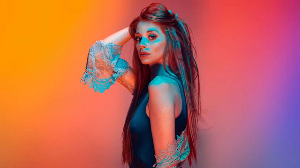 Redhead Woman with Lace Sleeves Neon Portrait 4K Desktop Wallpaper
