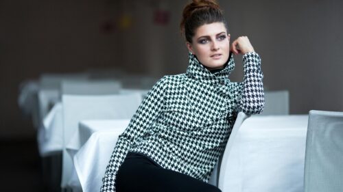 Elegant Woman in Houndstooth Turtleneck Fashion 4K Wallpaper