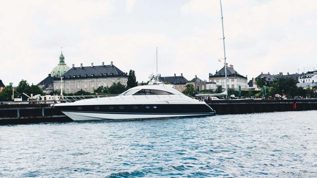 Luxurious Modern Yacht Docked in Copenhagen Harbor Desktop Wallpaper