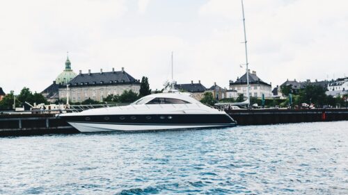 Luxurious Modern Yacht Docked in Copenhagen Harbor Desktop Wallpaper
