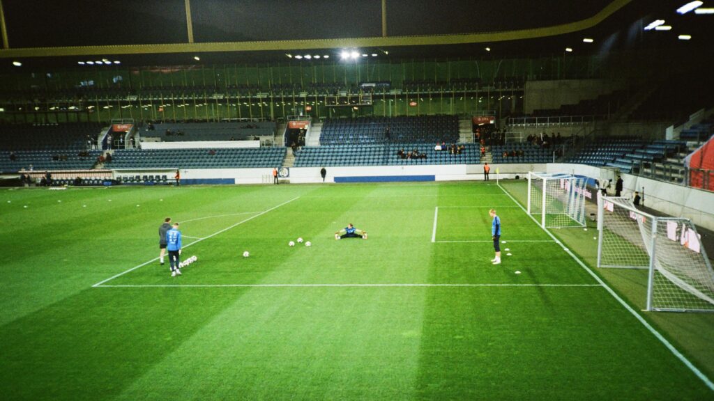 Professional Footballers Training at Stadium Field Desktop Wallpaper