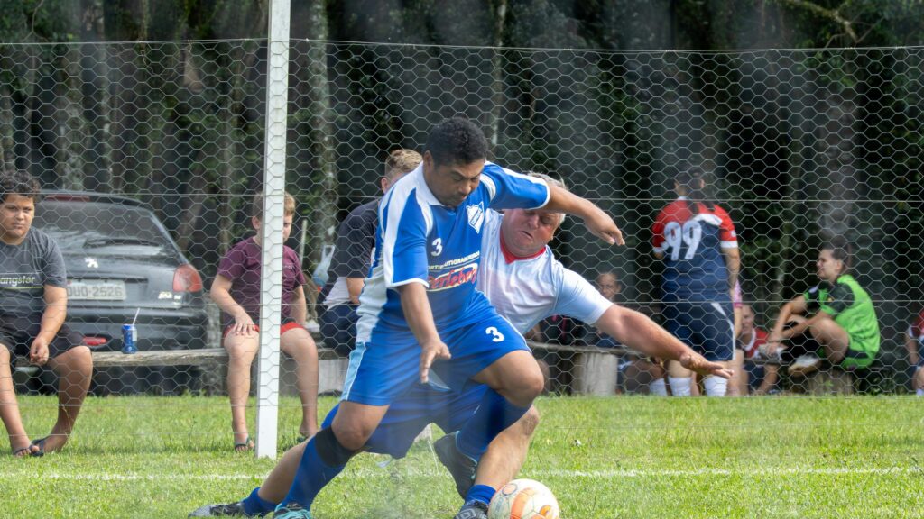 Intense Amateur Soccer Match Action Shot 4K Wallpaper