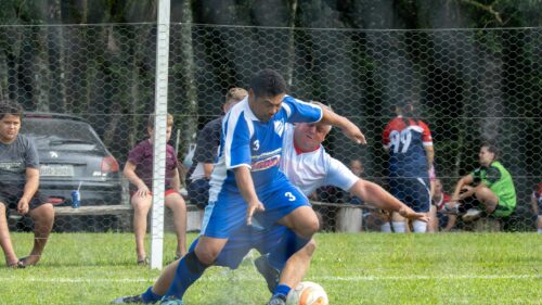 Intense Amateur Soccer Match Action Shot 4K Wallpaper