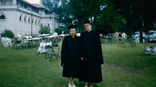 Two Women in Academic Regalia Vintage Graduation Day Desktop Wallpaper