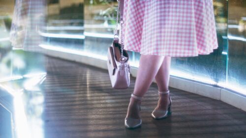 Stylish Woman in Gingham Skirt and Heels Desktop Wallpaper