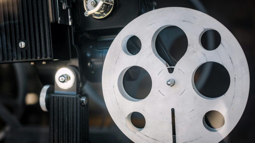 Vintage Kodascope Film Reel Close-Up 4K Desktop Wallpaper
