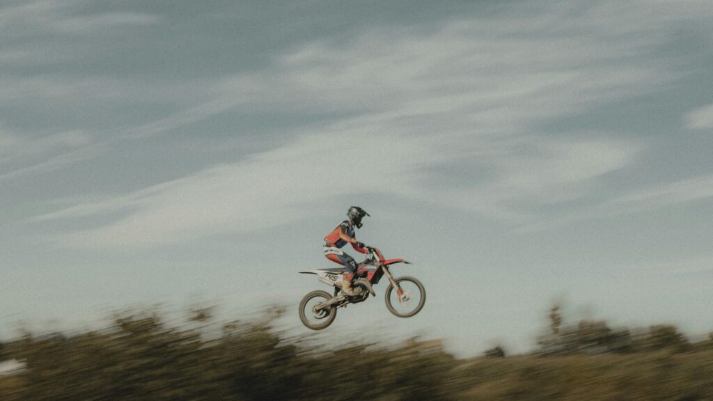 Motocross Rider Mid-Air Jump Action 4K Wallpaper