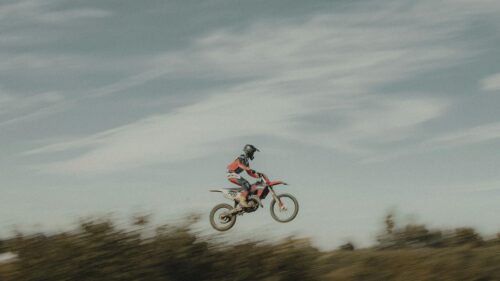 Motocross Rider Mid-Air Jump Action 4K Wallpaper
