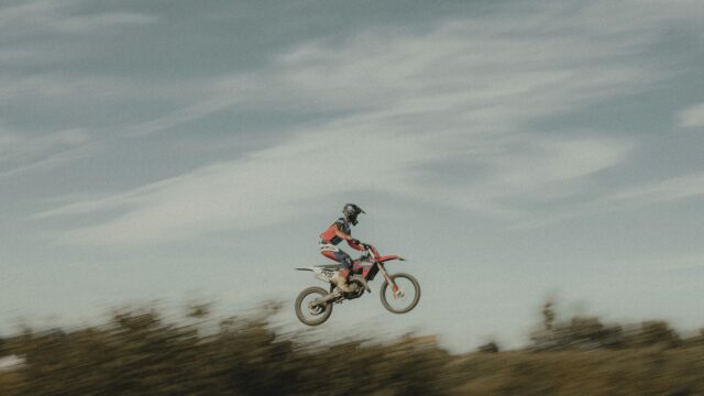 Motocross Rider Mid-Air Jump Action 4K Wallpaper