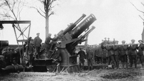 Historical WWI Artillery Cannon Crew in Action Desktop Wallpaper