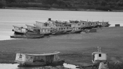 Black and White Riverboats Moored on Dry Land Desktop Wallpaper