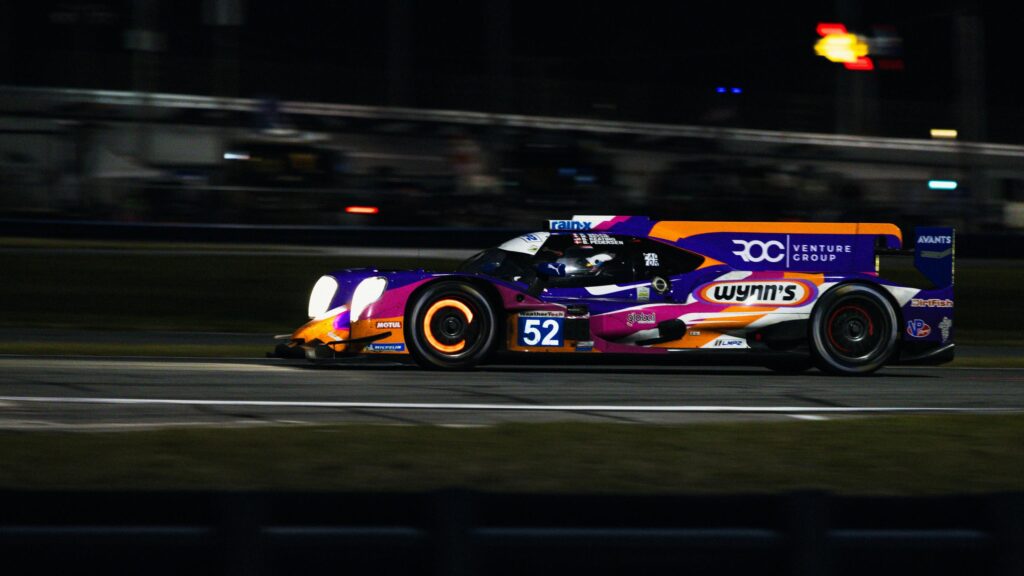 Purple and Orange Wynn's Racing Prototype at Night Desktop Wallpaper