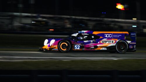 Purple and Orange Wynn’s Racing Prototype at Night Desktop Wallpaper