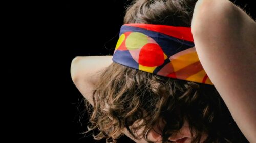 Curly Hairstyle with Colorful Geometric Headband Desktop Wallpaper