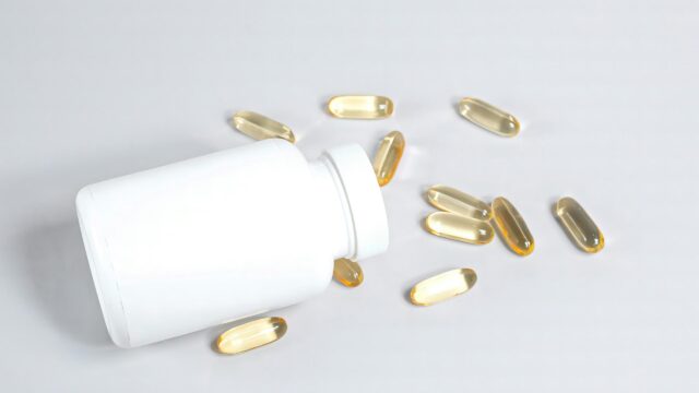 Minimalist White Supplement Bottle and Omega 3 Capsules 4K Wallpaper