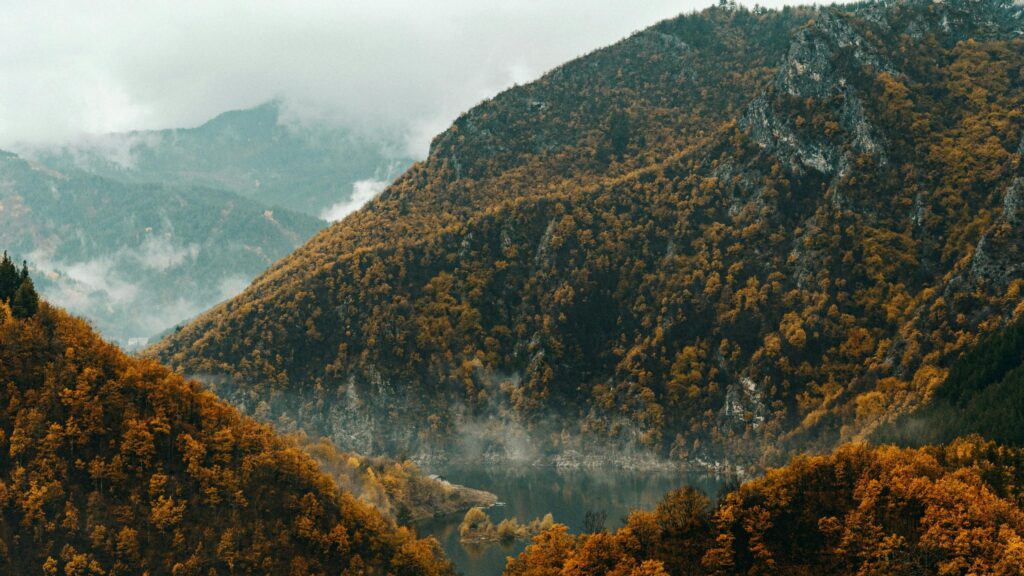 Breathtaking Autumn Mountain Valley Lake Scenery 4K Desktop Wallpaper