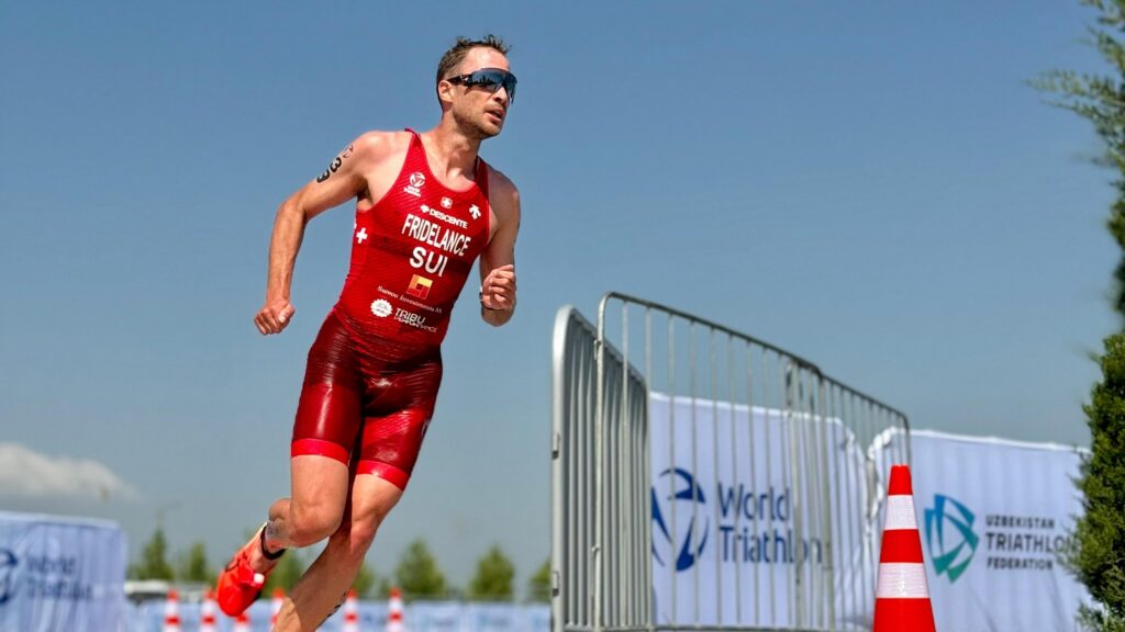 Professional Triathlete Running in Competition 4K Desktop Wallpaper