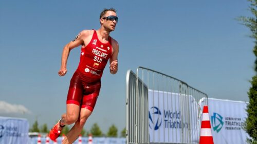 Professional Triathlete Running in Competition 4K Desktop Wallpaper