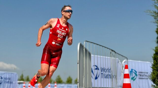 Professional Triathlete Running in Competition 4K Desktop Wallpaper