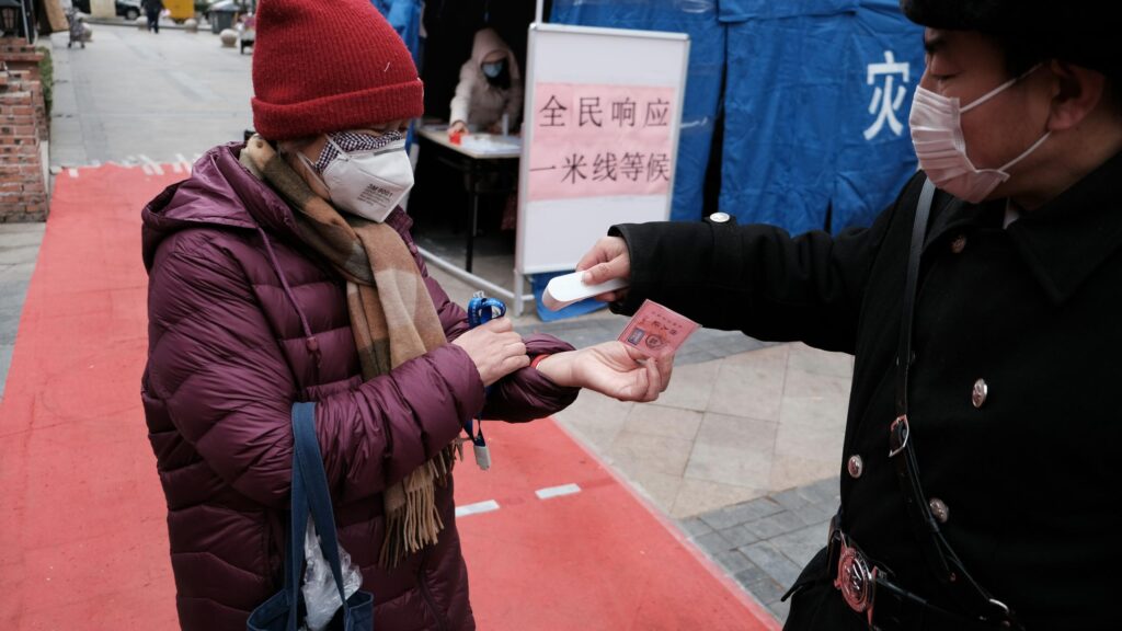 Document Verification at a Public Health Checkpoint 4K Wallpaper