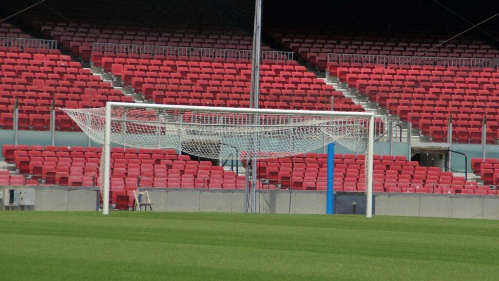 Empty Professional Soccer Stadium Goal Post 4K Wallpaper