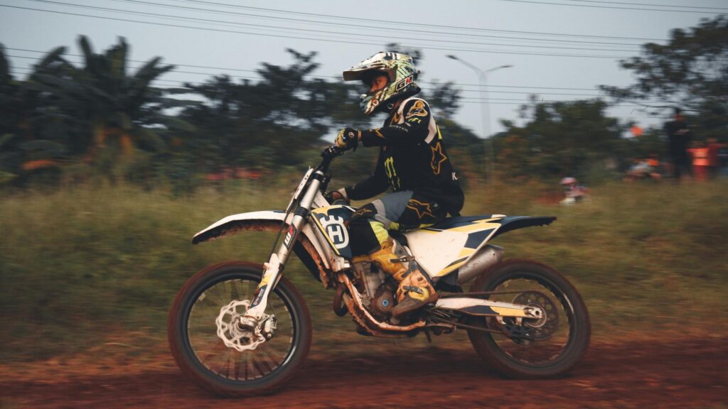 Action Motocross Rider on Husqvarna Bike Desktop Wallpaper