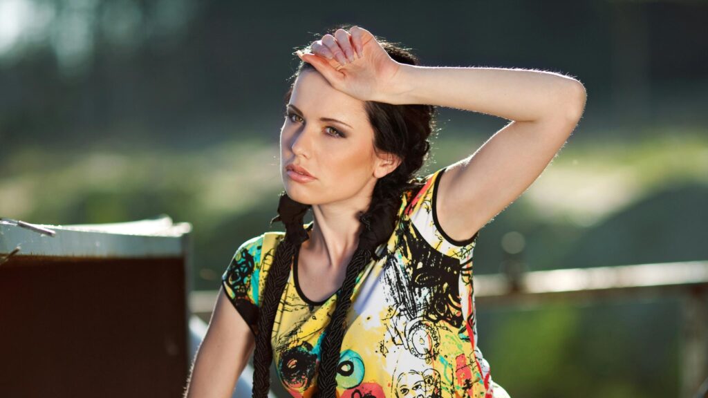 Stunning Fashion Portrait of Young Woman with Braided Hair 4K Wallpaper