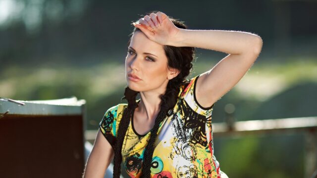 Stunning Fashion Portrait of Young Woman with Braided Hair 4K Wallpaper