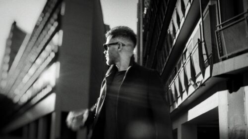 Stylish Man in Overcoat Urban Street Photography Desktop Wallpaper