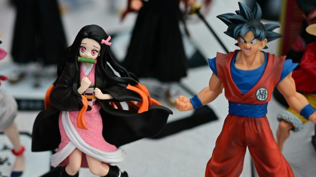 Anime Heroes Nezuko Kamado and Son Goku Action Figures Desktop Wallpaper